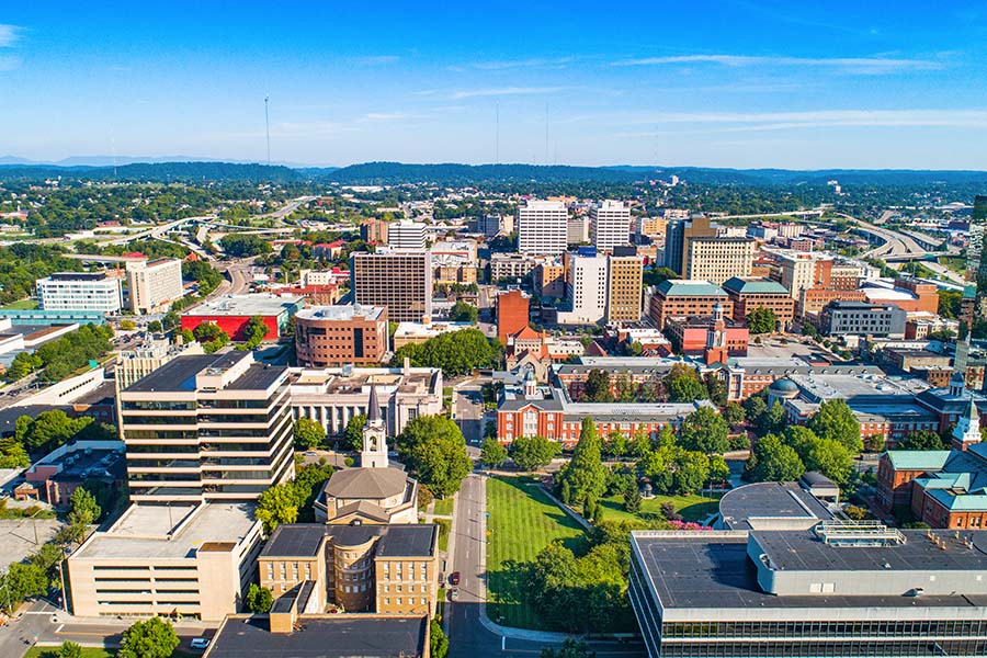 Knoxville TN - Aerial View of Downtown Knoxville Tennessee Against Blue Sky on Sunny Day